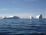 [Photo of icebergs]