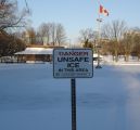 [Photo of a sign in Victoria Park reading "Unsafe Ice"]