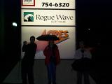 [Photo of Chad, Elizabeth, and Craig in front of the Rogue Wave sign]