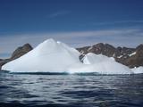 [Photo of iceberg]