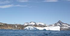 [Photo of iceberg]