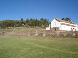 [Photo of church on Incan ruins]